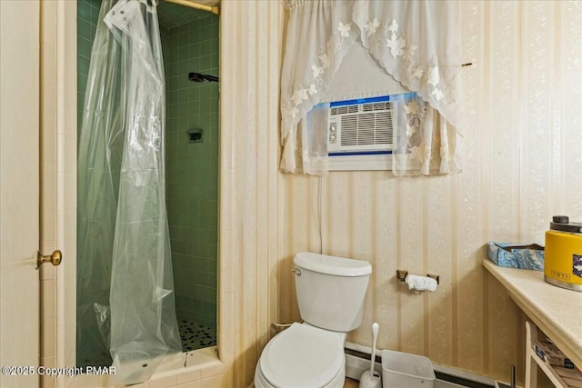 full bath featuring toilet and a stall shower