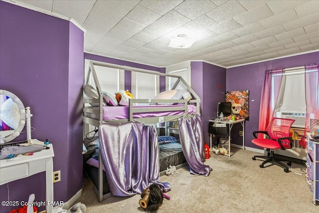 carpeted bedroom with cooling unit and baseboards