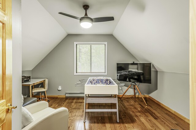 268 Outer Dr, Pocono Lake, PA 18347 - office area with a baseboard radiator, wood finished floors, ceiling fan, vaulted ceiling, and baseboards