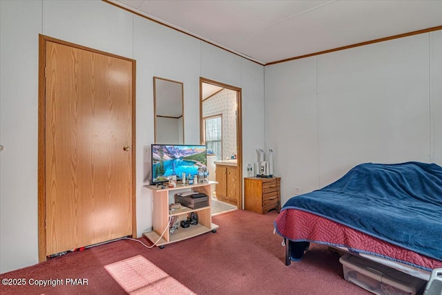 carpeted bedroom featuring ornamental molding