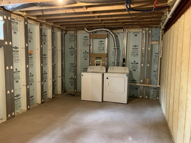 below grade area with washing machine and dryer and gas water heater