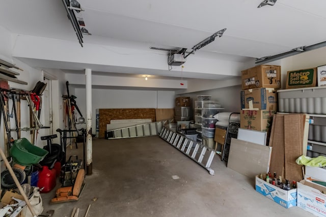 garage featuring a garage door opener