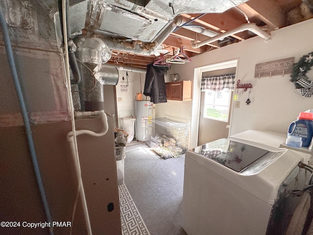 interior space featuring washer / dryer, laundry area, and electric water heater