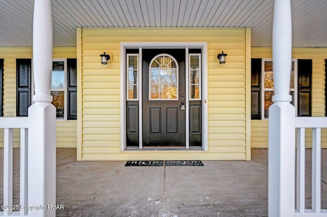 property entrance with a porch