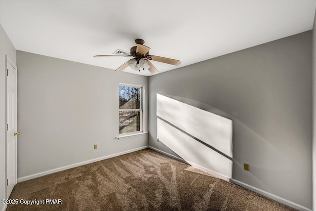 unfurnished bedroom featuring carpet floors, ceiling fan, and baseboards