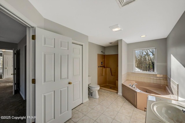 bathroom featuring visible vents, toilet, a shower stall, a whirlpool tub, and tile patterned floors