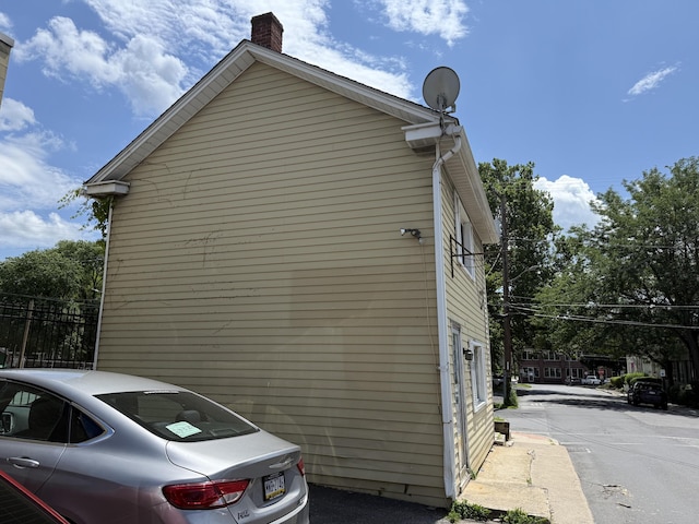 5 S 9th St, Stroudsburg, PA 18360 - view of home's exterior with a chimney