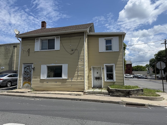 5 S 9th St, Stroudsburg, PA 18360 - townhome / multi-family property featuring a chimney
