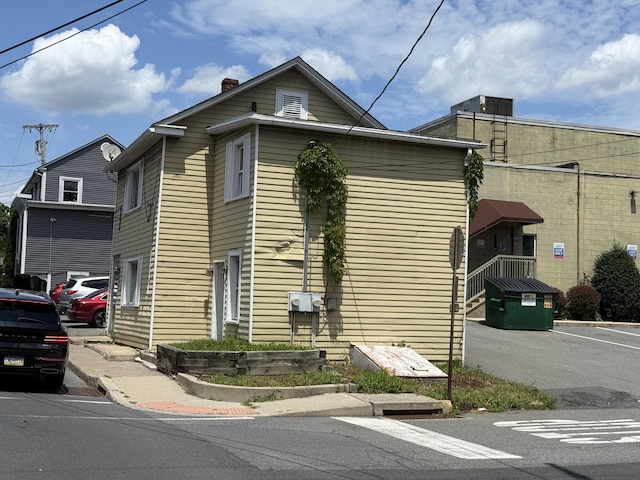 5 S 9th St, Stroudsburg, PA 18360 - view of home's exterior featuring a chimney