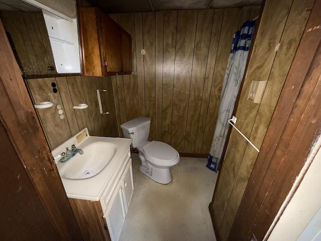 5 S 9th St, Stroudsburg, PA 18360 - half bathroom featuring wood walls and vanity
