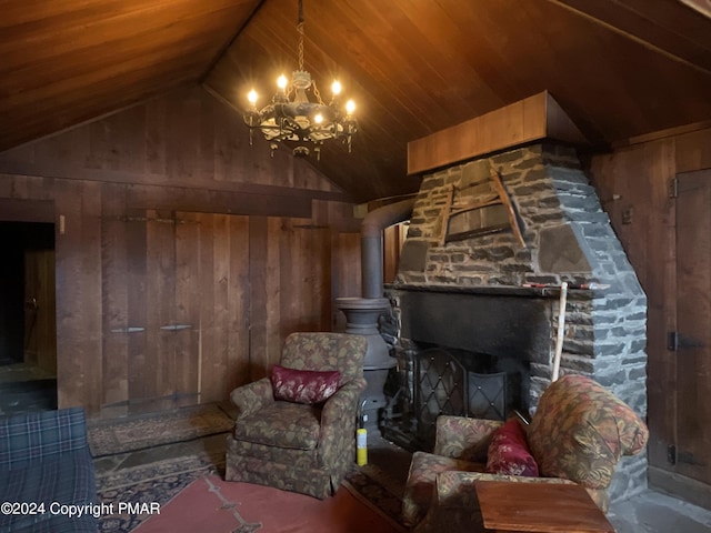 living area with a chandelier, wood walls, wooden ceiling, and lofted ceiling