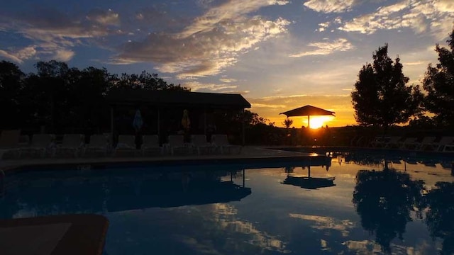 138 Banbury Dr, Bushkill, PA 18324 - pool at dusk with an outdoor pool and a patio