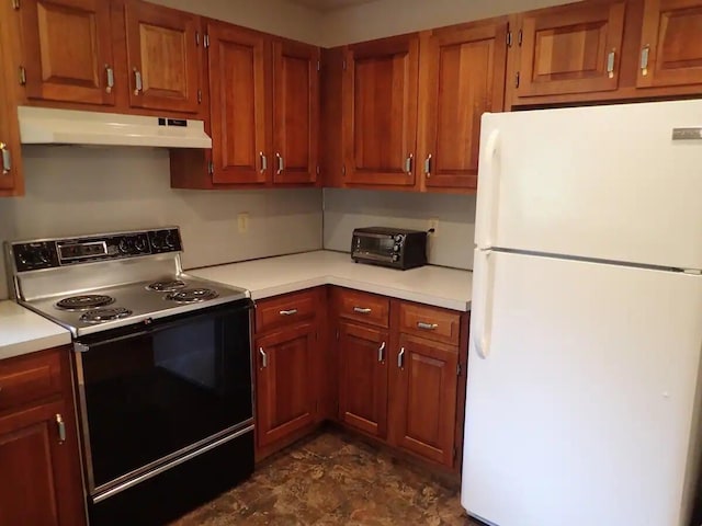 138 Banbury Dr, Bushkill, PA 18324 - kitchen with freestanding refrigerator, electric stove, under cabinet range hood, light countertops, and brown cabinetry