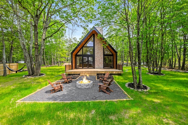 2154 Valleyview Dr, Bushkill, PA 18324 - view of green lawn with an outdoor fire pit