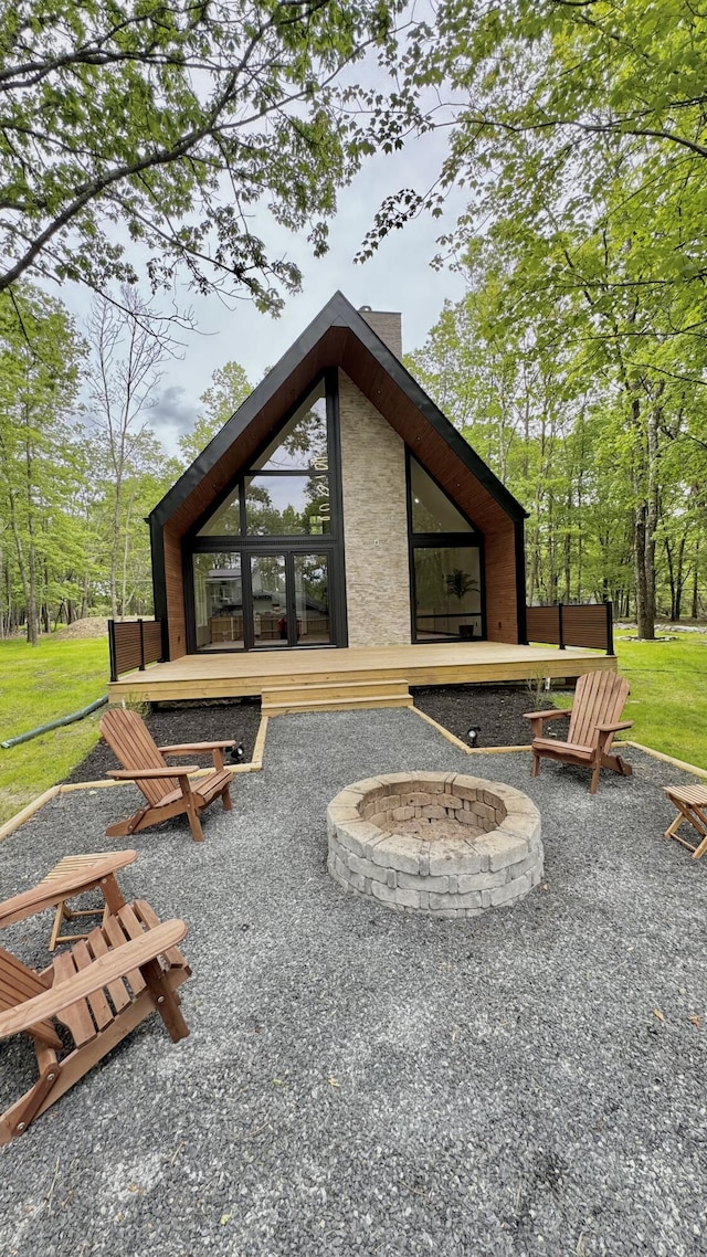 2154 Valleyview Dr, Bushkill, PA 18324 - view of patio featuring an outdoor fire pit