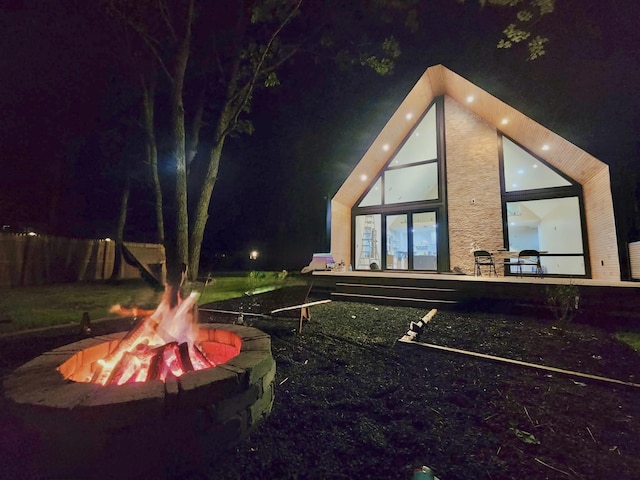 2154 Valleyview Dr, Bushkill, PA 18324 - yard at twilight featuring an outdoor fire pit