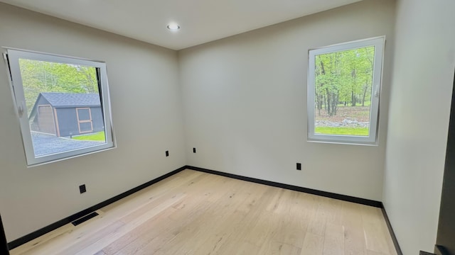 2154 Valleyview Dr, Bushkill, PA 18324 - empty room with baseboards, healthy amount of natural light, light wood-type flooring, and recessed lighting