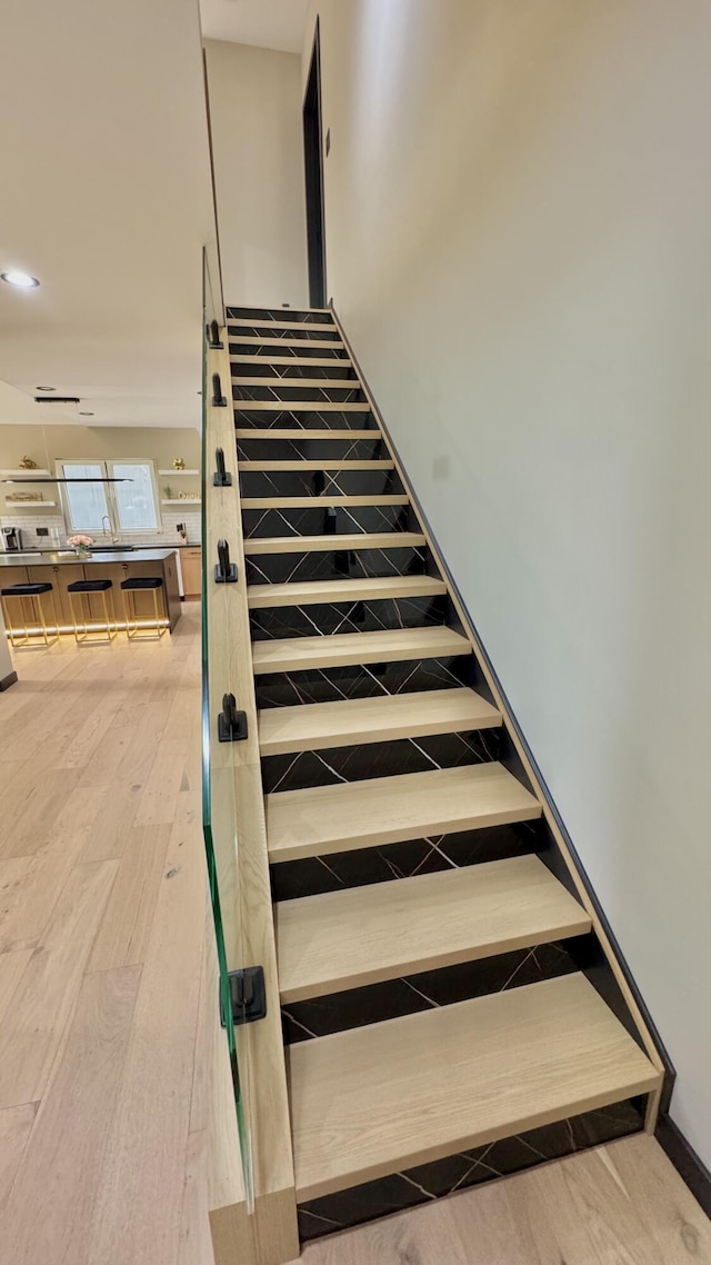 2154 Valleyview Dr, Bushkill, PA 18324 - stairs featuring wood finished floors