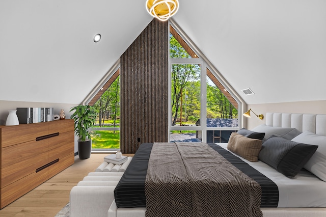2154 Valleyview Dr, Bushkill, PA 18324 - bedroom with vaulted ceiling and wood finished floors