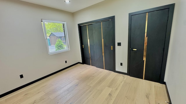 2154 Valleyview Dr, Bushkill, PA 18324 - unfurnished bedroom featuring wood finished floors, baseboards, and recessed lighting