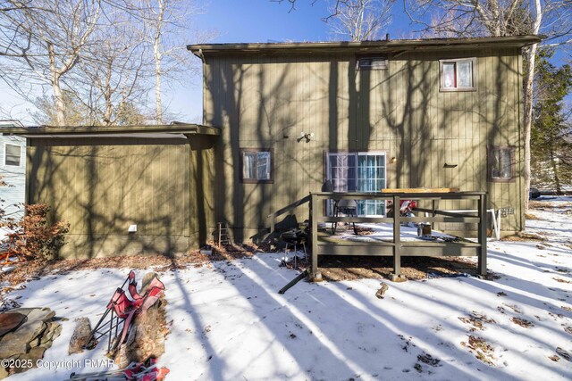 view of snow covered property