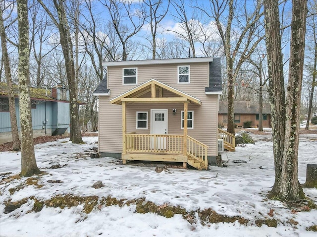 view of front of home with roof with shingles