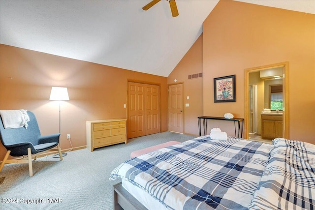 bedroom with high vaulted ceiling, a closet, visible vents, and carpet flooring