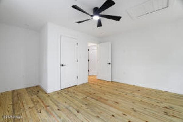 118 Eagle Rock Rd, Lackawaxen, PA 18435 - unfurnished bedroom featuring wood finished floors and ceiling fan