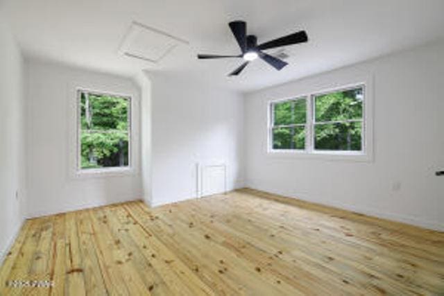 118 Eagle Rock Rd, Lackawaxen, PA 18435 - spare room featuring attic access, healthy amount of natural light, and hardwood / wood-style floors