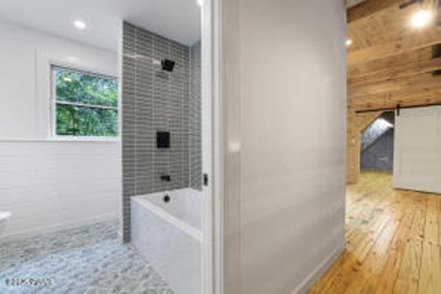 118 Eagle Rock Rd, Lackawaxen, PA 18435 - full bath with wood finished floors, shower / bath combination, and recessed lighting