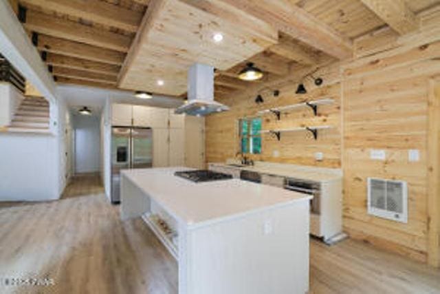 118 Eagle Rock Rd, Lackawaxen, PA 18435 - kitchen with stainless steel fridge with ice dispenser, extractor fan, black stovetop, light wood finished floors, and open shelves