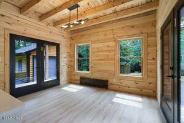 118 Eagle Rock Rd, Lackawaxen, PA 18435 - doorway to outside featuring wooden walls, a wood ceiling with exposed beams, wood finished floors, and french doors