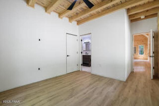 118 Eagle Rock Rd, Lackawaxen, PA 18435 - spare room featuring a ceiling fan, a wooden ceiling with exposed beams, and light wood-style floors
