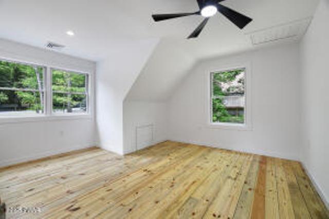 118 Eagle Rock Rd, Lackawaxen, PA 18435 - additional living space featuring hardwood / wood-style floors and vaulted ceiling