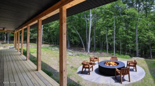 118 Eagle Rock Rd, Lackawaxen, PA 18435 - wooden deck with a fire pit