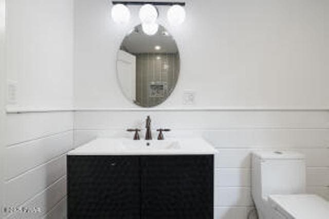 118 Eagle Rock Rd, Lackawaxen, PA 18435 - bathroom with vanity and tile walls