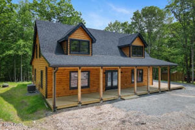 118 Eagle Rock Rd, Lackawaxen, PA 18435 - view of front of house with a front yard