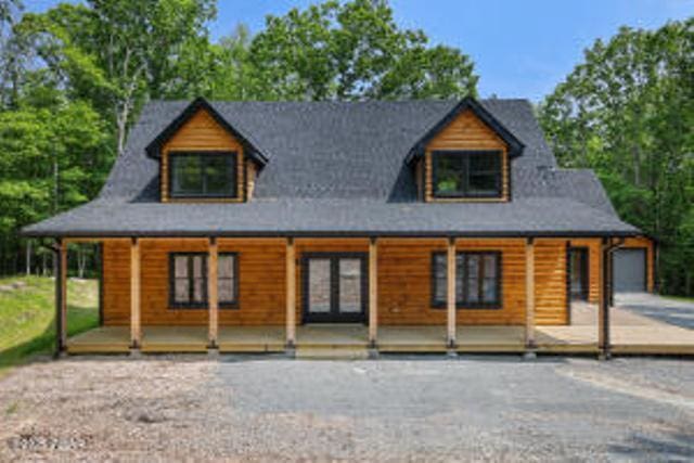 118 Eagle Rock Rd, Lackawaxen, PA 18435 - view of front of property featuring covered porch and french doors