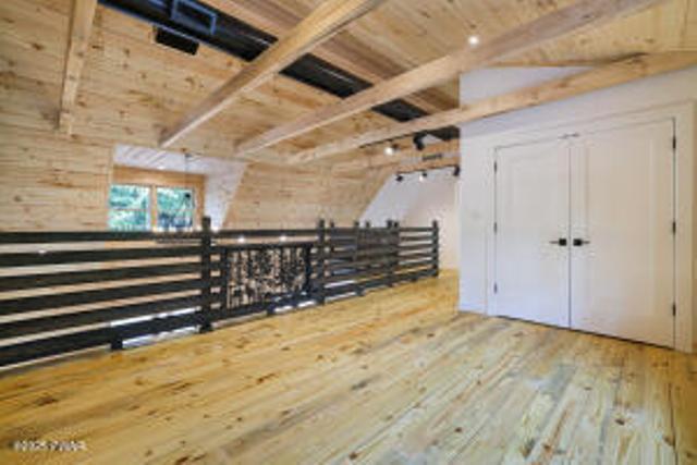 118 Eagle Rock Rd, Lackawaxen, PA 18435 - additional living space featuring wood-type flooring and a wooden ceiling with exposed beams