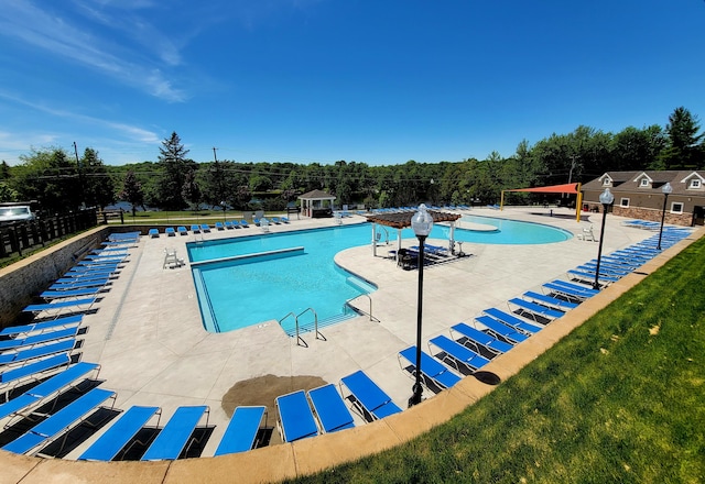 911 Granite Ter, Tobyhanna, PA 18466 - community pool with a patio area and view of wooded area