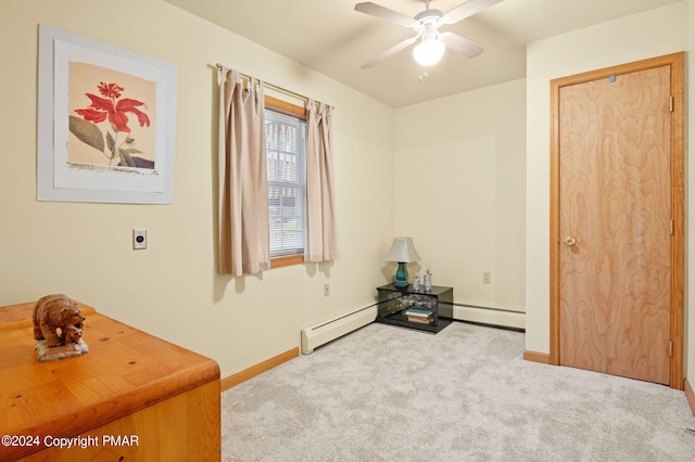 miscellaneous room with ceiling fan, baseboard heating, carpet, and baseboards