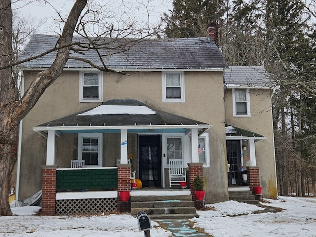 135 Marsh Rd, Stroudsburg, PA 18360 - view of front of house featuring covered porch, stucco siding, a chimney, and a shingled roof