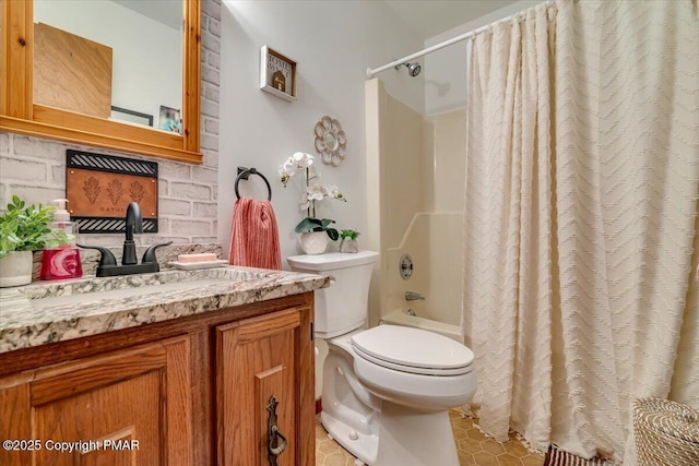 full bathroom with shower / bath combo, toilet, and vanity