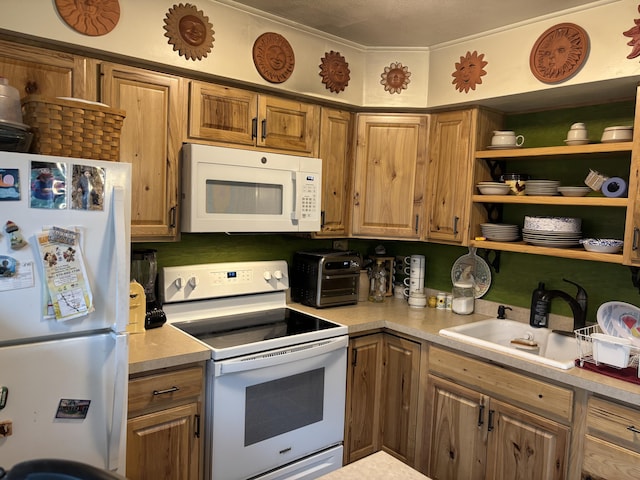 kitchen with open shelves, brown cabinets, a sink, light countertops, and white appliances
