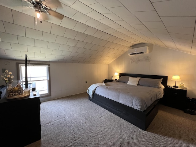 bedroom with lofted ceiling, carpet, and a wall mounted air conditioner
