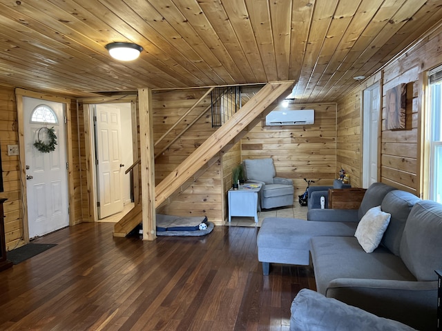living room featuring a wall mounted air conditioner, wooden ceiling, wood-type flooring, and wooden walls