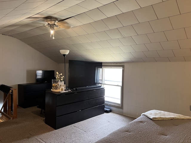 bedroom with vaulted ceiling and carpet floors