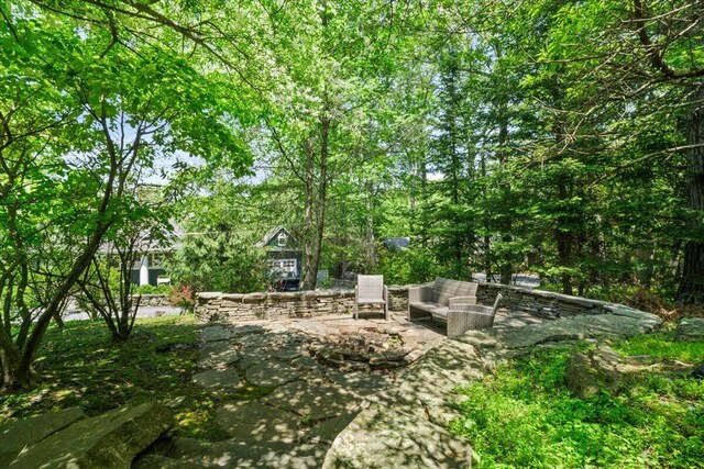 2135 Laurel Rd, Buck Hill Falls, PA 18323 - view of patio featuring an outdoor fire pit