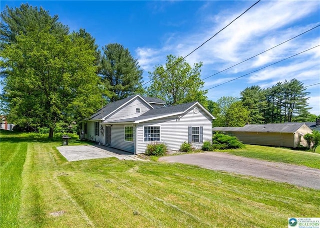 7112 Howell Ter, Stroudsburg, PA 18360 - view of front of house featuring a patio area and a front lawn