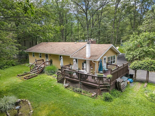 2125 Sassafras Ln, Kunkletown, PA 18058 - rear view of house featuring a chimney, a yard, and a wooden deck